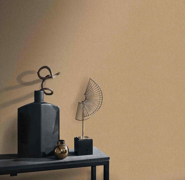 Erismann Fashion For Walls 4 10376-30 wallpaper lounge feature wall behind a slim console table with a black vase, small metallic vase and a wire fan sculpture, minimalist and calm.