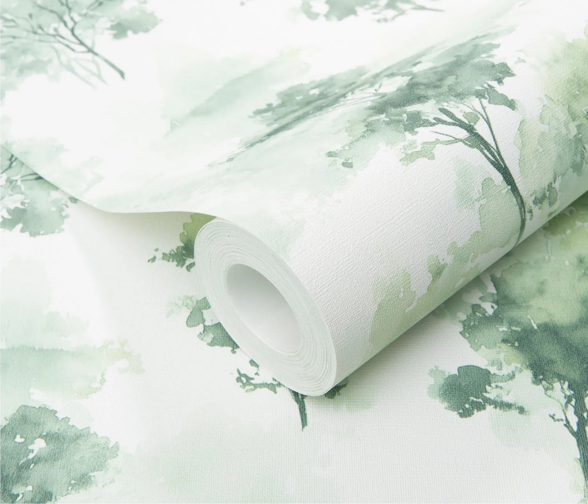 Erismann Forest Dreams 10557-07 wallpaper roll close-up with pale green watercolor tree silhouettes and fine woven texture.