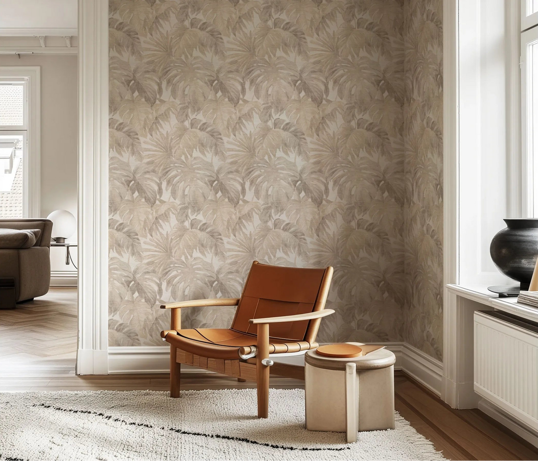 Erismann Forest Dreams 10558-02 wallpaper on a corner wall behind a tan lounge chair and round side table.