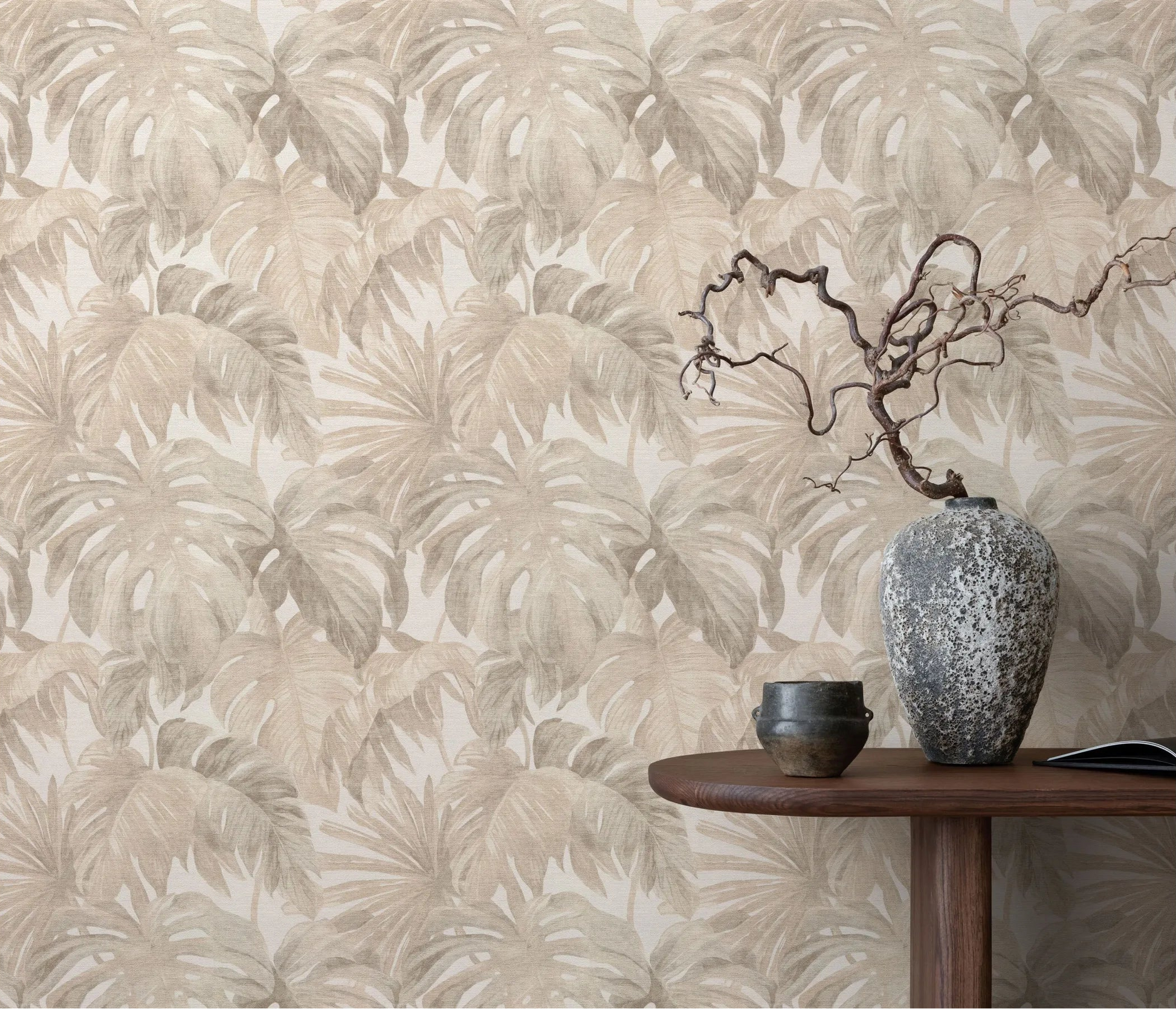 Erismann Forest Dreams 10558-02 wallpaper on a wall behind a wooden table with ceramic vases and an open book.