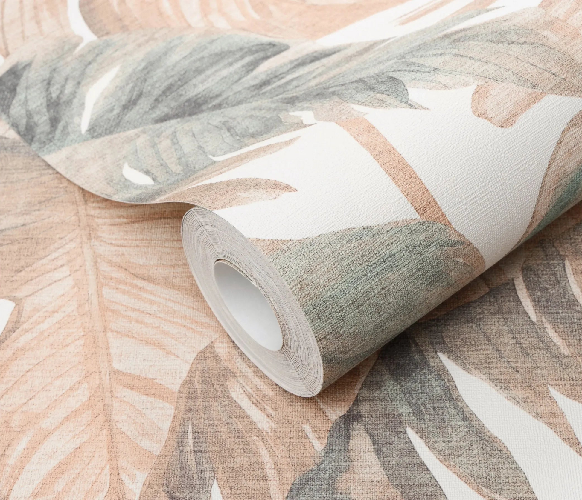 Erismann Forest Dreams 10558-11 wallpaper roll close-up with muted botanical leaves and a woven textured finish.