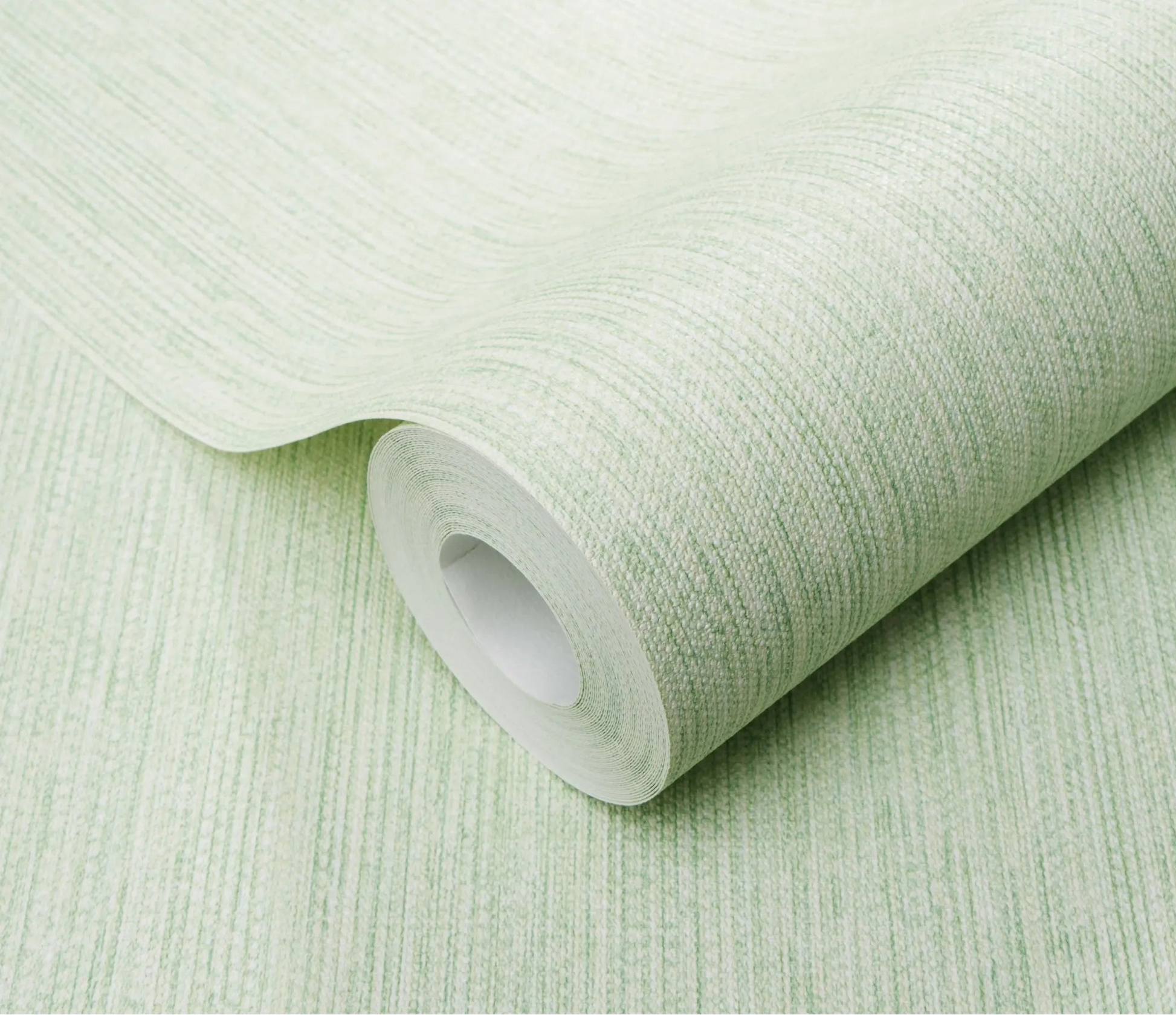 Erismann Forest Dreams 10559-07 wallpaper roll close-up with pale green woven texture and subtle vertical striations.
