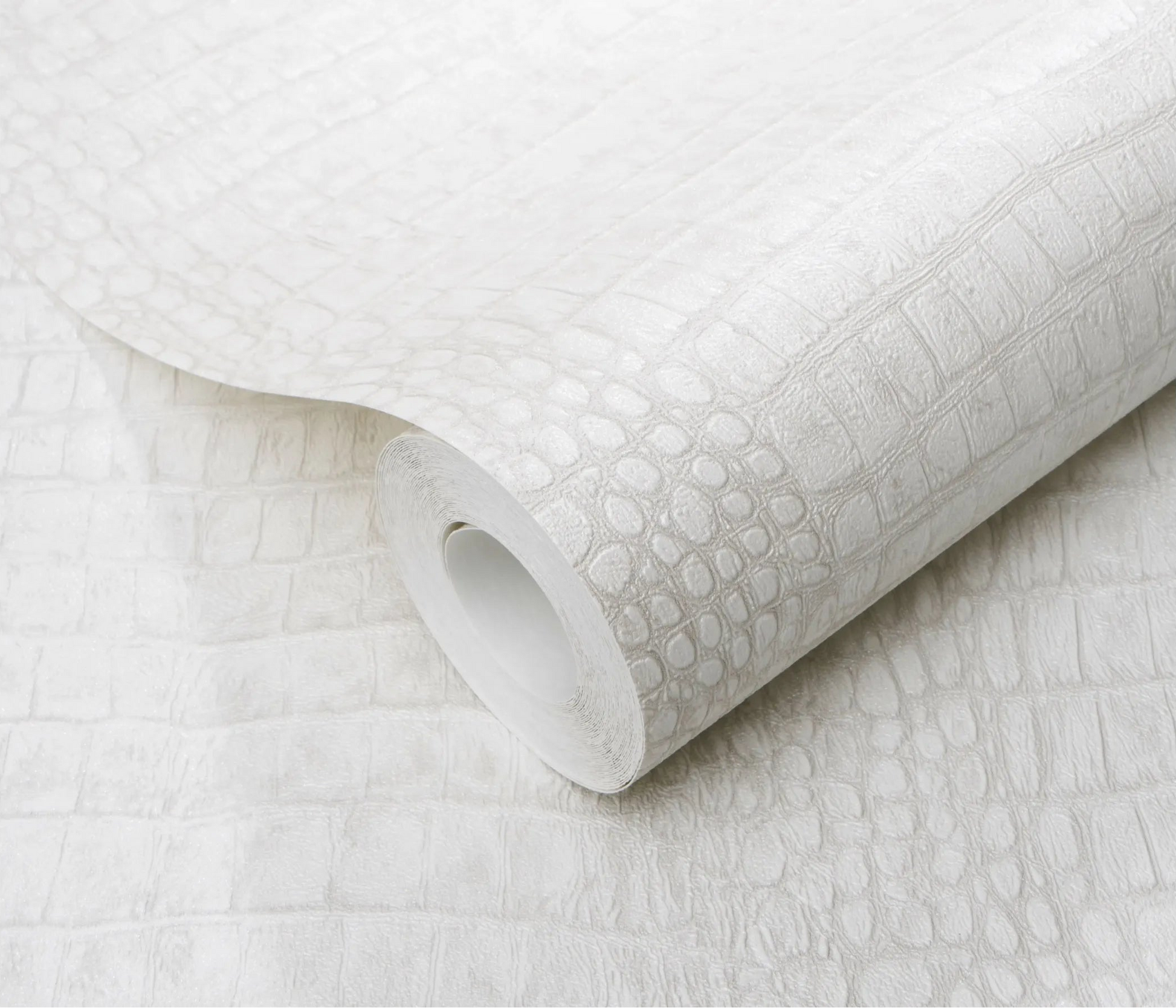 Erismann Forest Dreams 10560-10 wallpaper roll close-up with white embossed rectangular scale texture and subtle sheen.