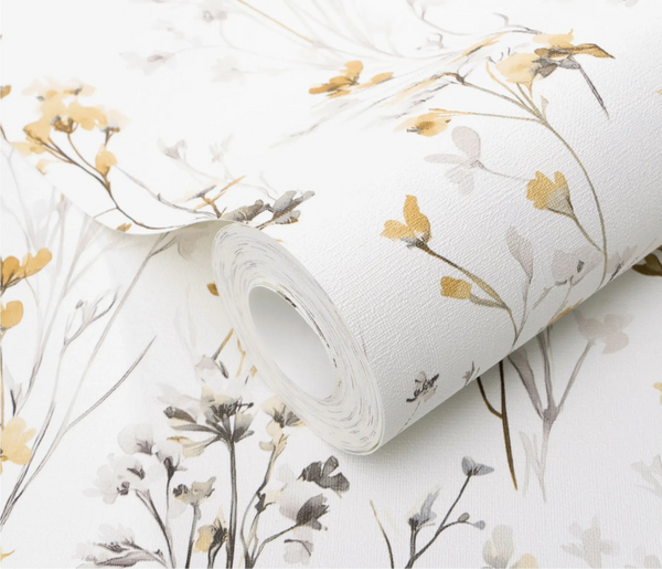 Erismann Forest Dreams 10561-20 wallpaper roll close-up with delicate botanical stems and yellow flowers on a woven white texture.