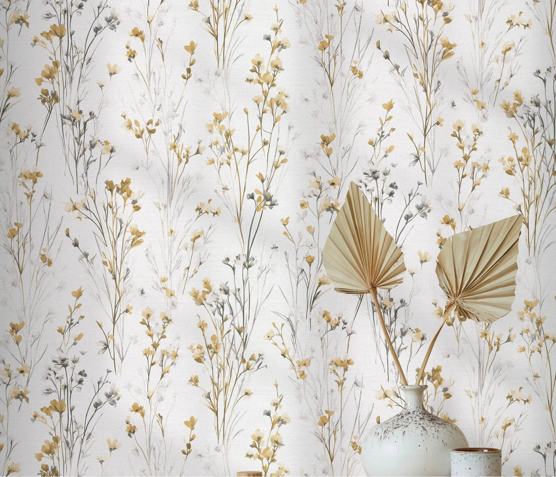 Erismann Forest Dreams 10561-20 wallpaper with delicate wildflower stems behind a ceramic vase and dried palm leaves.