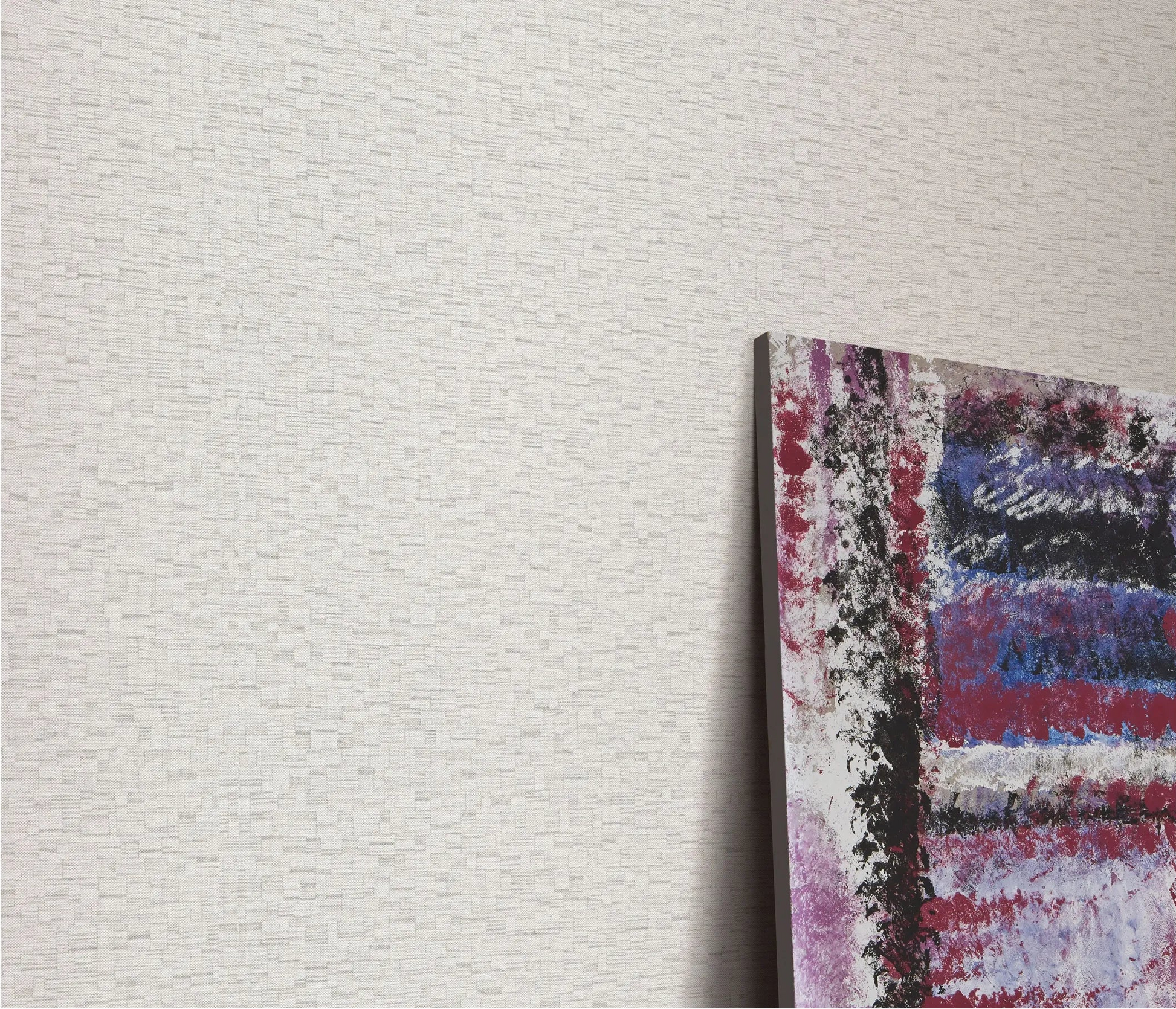 Erismann Forest Dreams 10562-38 wallpaper on a textured pale wall beside a colorful abstract canvas.