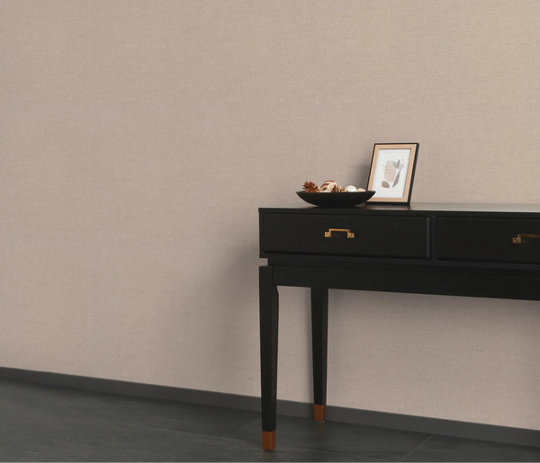 Erismann Forest Dreams 10563-05 wallpaper on the wall behind a black chest of drawers with framed art and a decorative bowl.