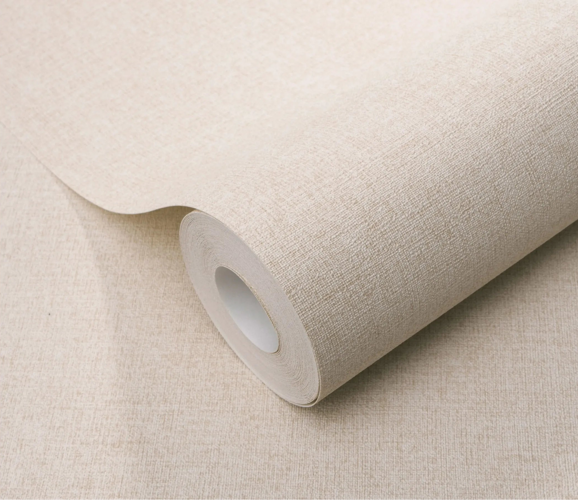 Erismann Forest Dreams 10563-14 wallpaper roll close-up with beige woven texture and subtle fine crosshatch surface.