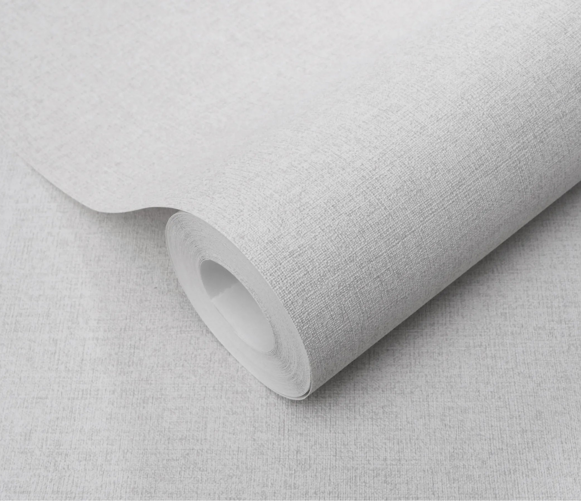 Erismann Forest Dreams 10563-31 wallpaper roll close-up with pale woven texture and subtle fine crosshatch finish.
