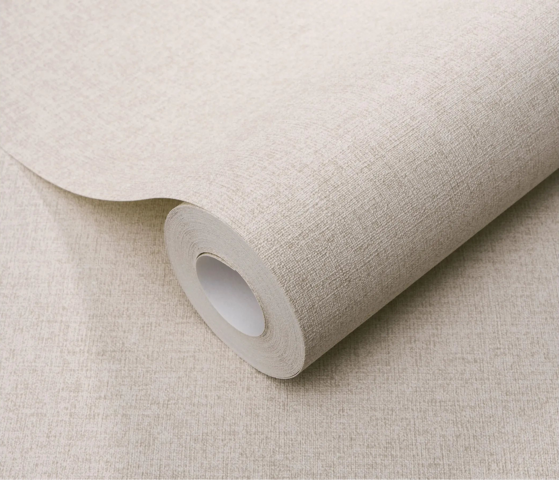 Erismann Forest Dreams 10563-38 wallpaper roll close-up with a subtle light neutral woven texture and fine fabric-like finish.