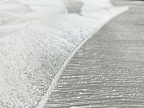 Marburg Avalon 31623 Close-up of textured wallpaper showing intersecting curved sections with alternating fine ridges and stippled areas in light neutral tones.