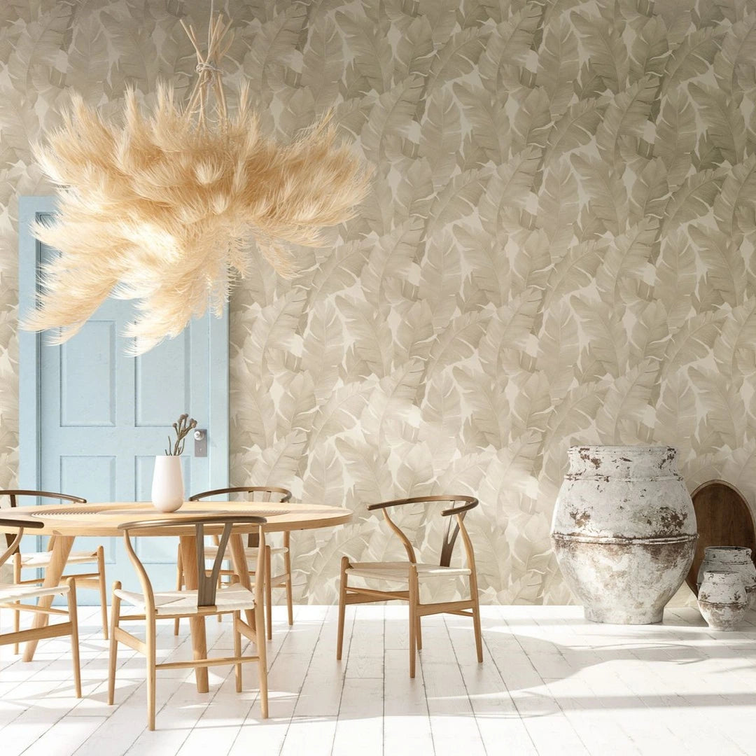 Marburg Avalon 31625 wallpaper roll with large tonal beige palm leaves on a soft white ground.
