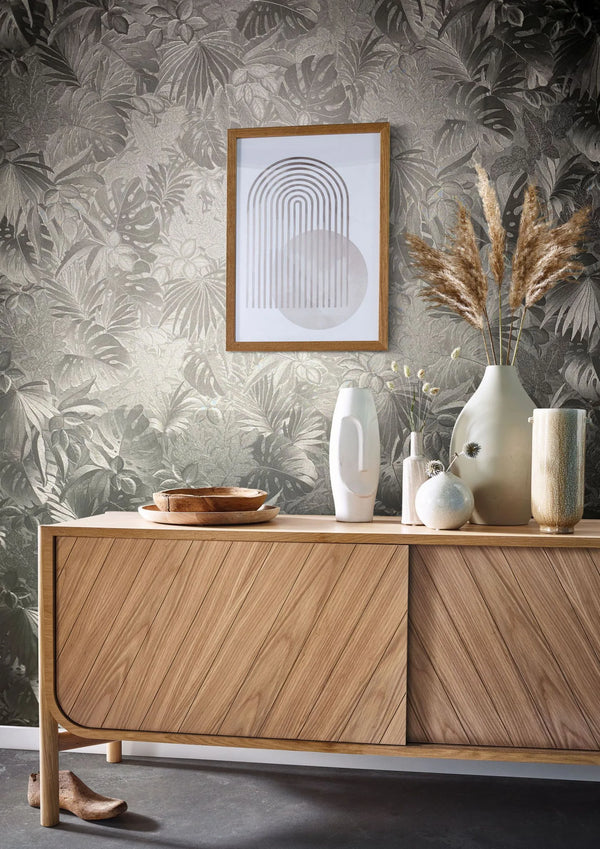 Marburg Botanica 33302 Tonal gray tropical foliage wallpaper with layered leaves and a subtle sheen and texture wallpaper shown in a styled detail.