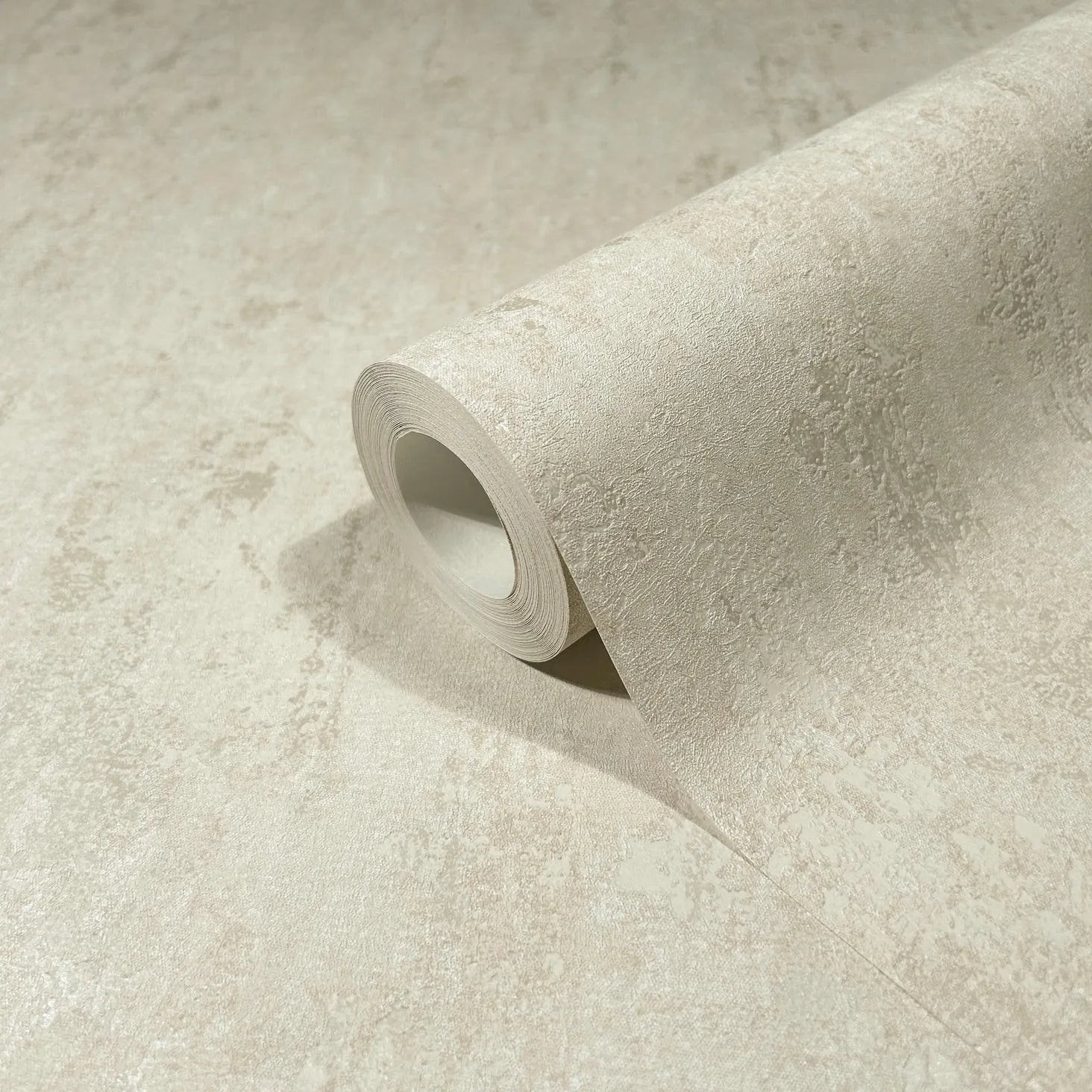 Marburg 35145 wallpaper close-up roll with subtle mottled texture in light neutral tones.
