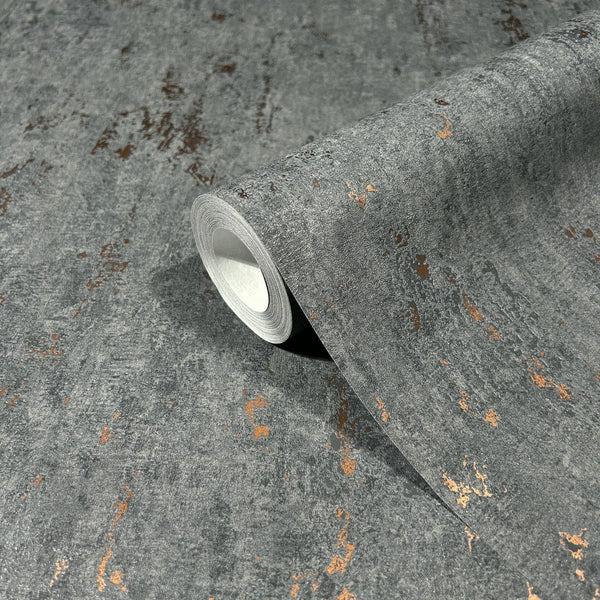 Marburg 35146 wallpaper close-up of gray textured finish with distressed copper flecks, roll partially unrolled.