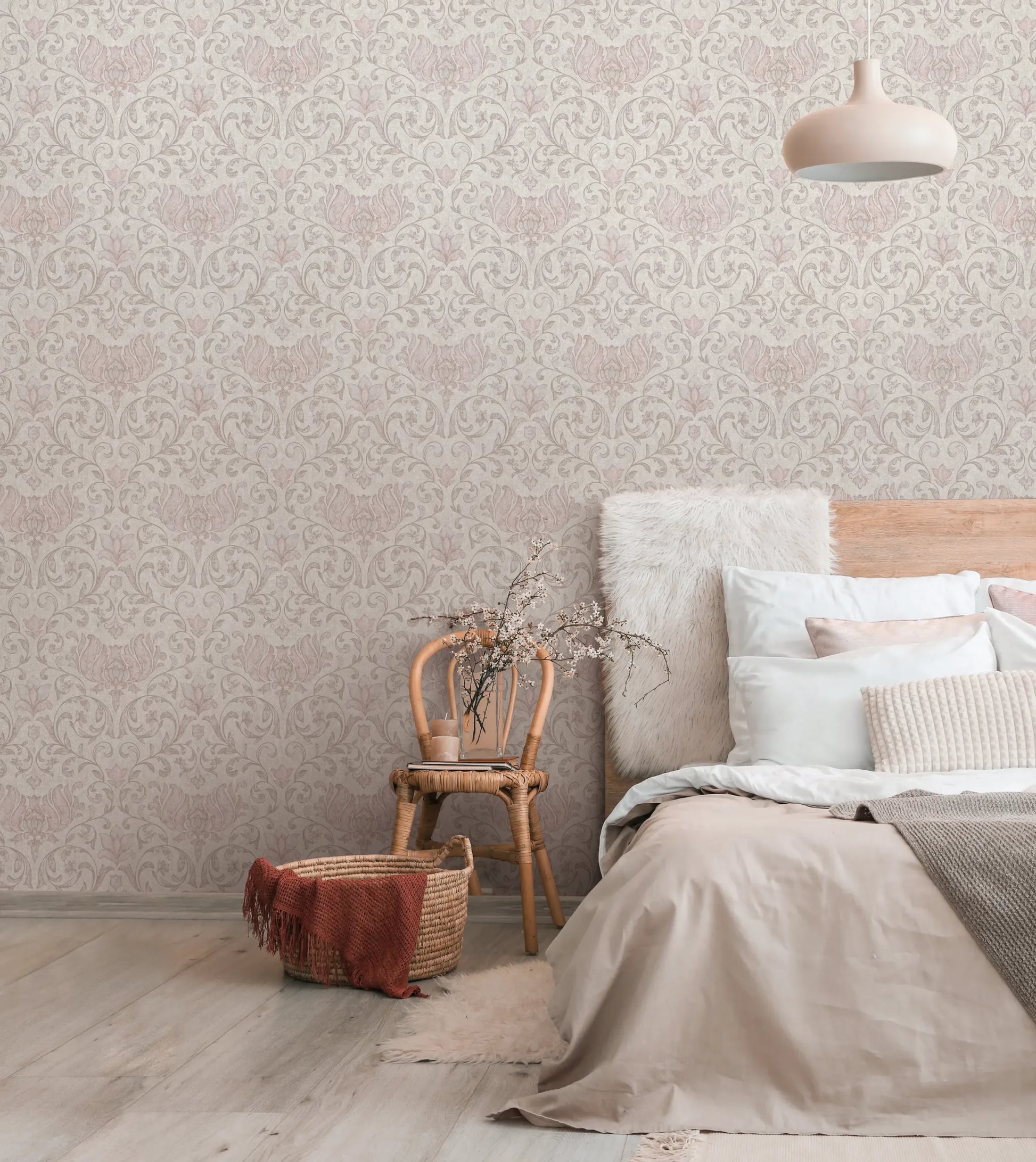 Marburg 35149 wallpaper cozy bedroom feature wall behind a wooden bed with layered pillows, rattan chair nightstand, pendant light, and woven basket.