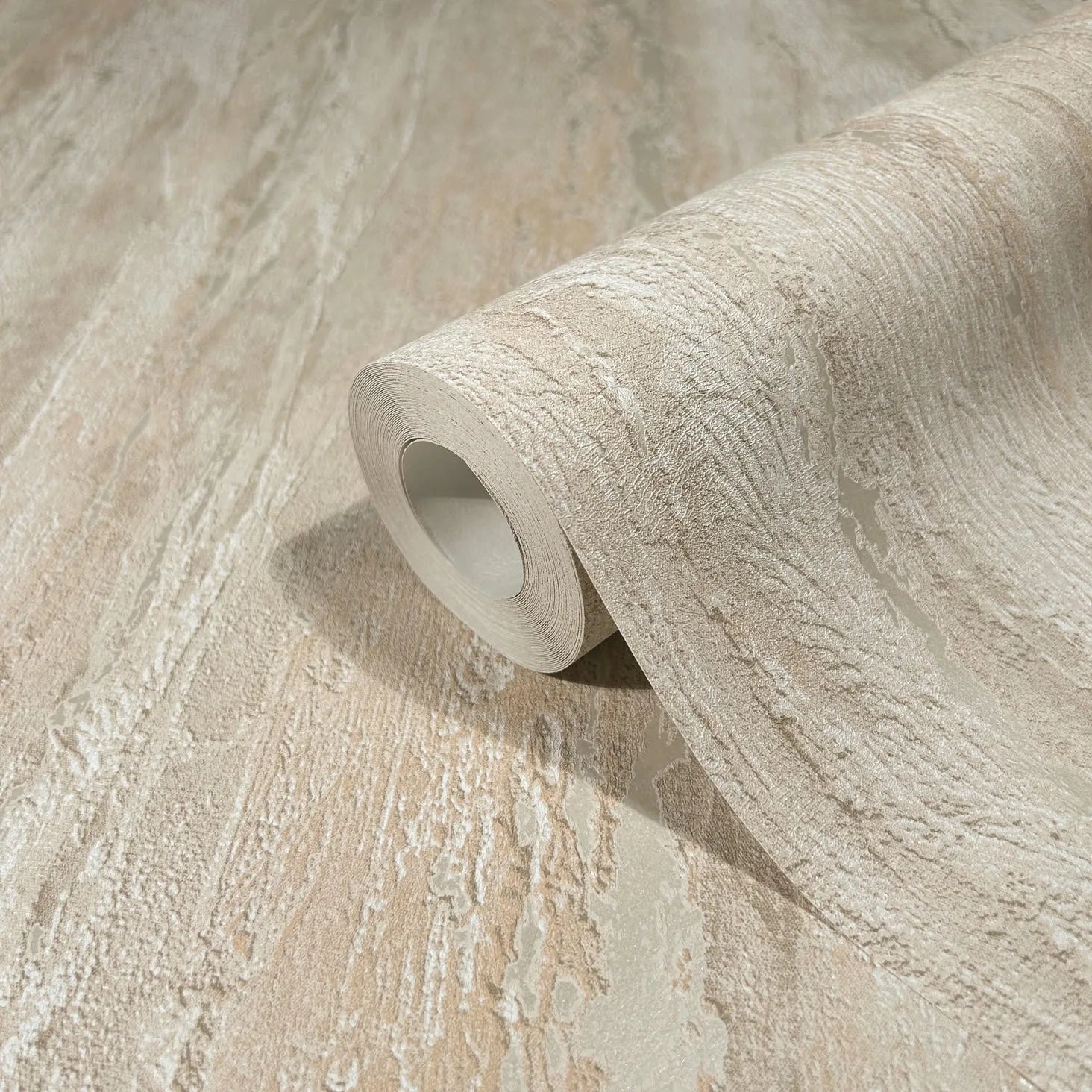Marburg 35154 wallpaper close-up of a rolled sheet with raised, stone-like texture.