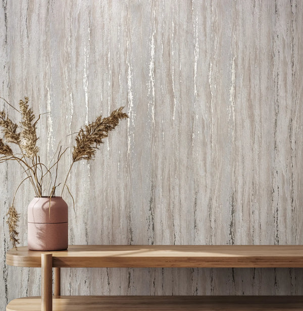 Marburg 35157 wallpaper lounge feature wall behind a wooden console with a pink vase of dried grasses, serene minimalist mood.