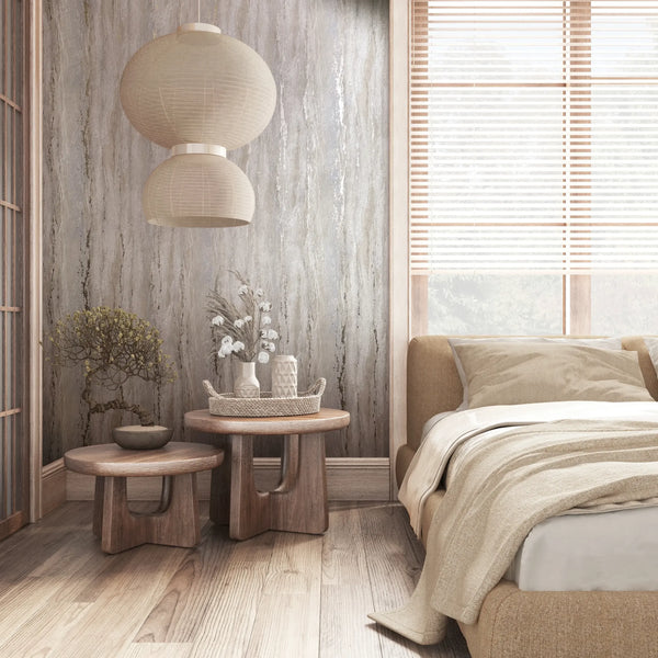 Marburg 35159 wallpaper bedroom feature wall with textured pattern, wooden nesting tables with woven tray and vases, bonsai plant, paper lantern pendants, and a cozy upholstered bed.