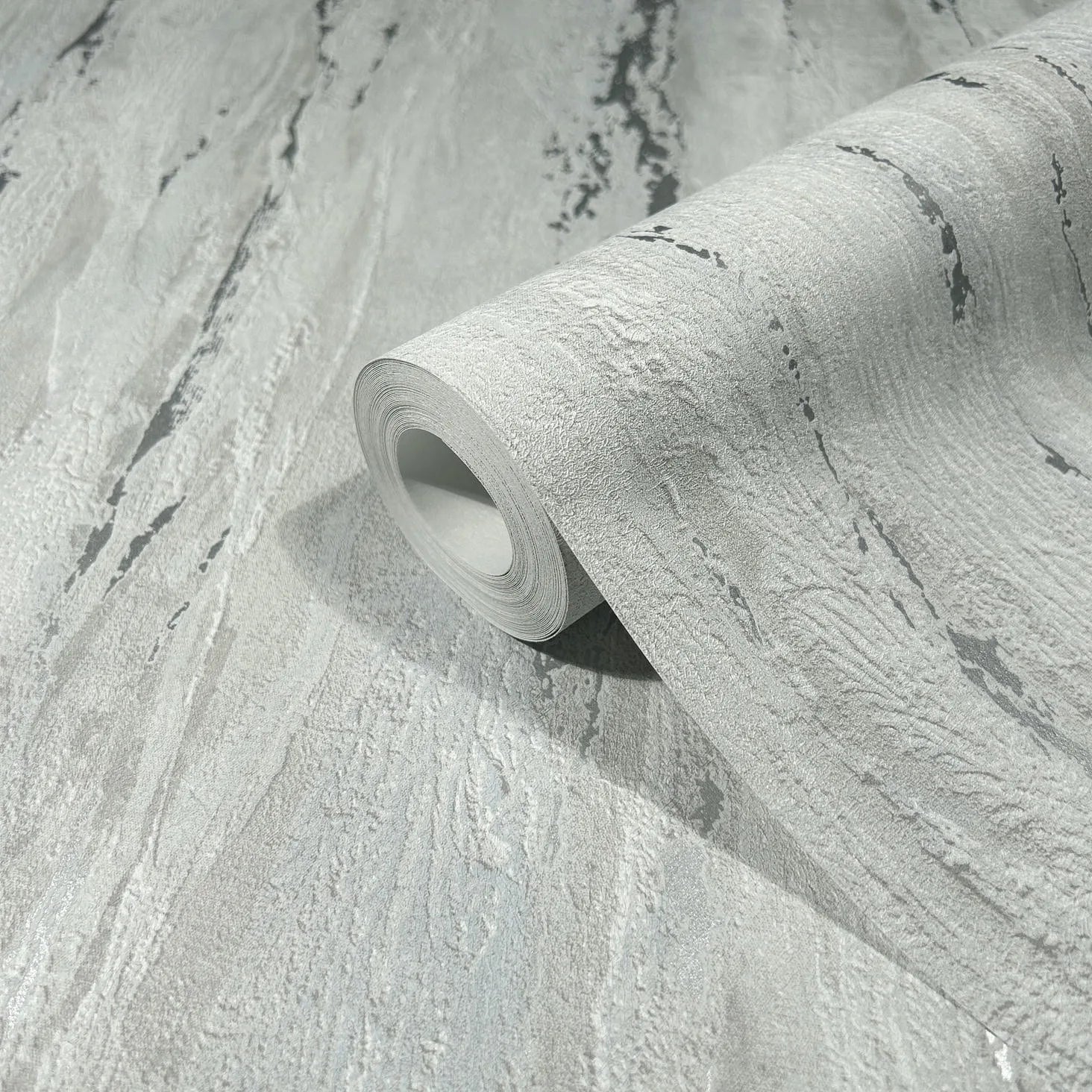 Marburg 35160 wallpaper close-up roll with textured light gray abstract streaks.
