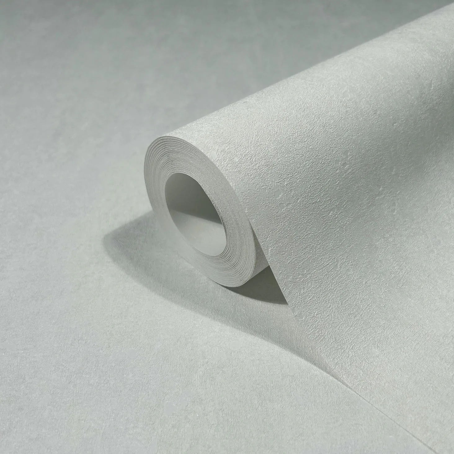 Marburg 35161 wallpaper close-up of textured roll on plain surface.