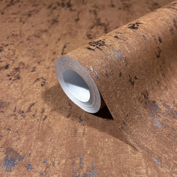 Marburg 35163 wallpaper close-up of a textured roll with a weathered mottled pattern and subtle metallic specks.