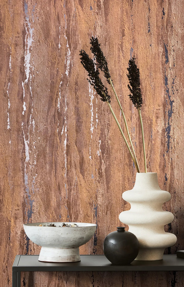 Marburg 35166 wallpaper lounge feature wall with textured abstract pattern behind a slim console styled with a sculptural vase of dried stems, a round vase, and a ceramic bowl for a calm contemporary mood.