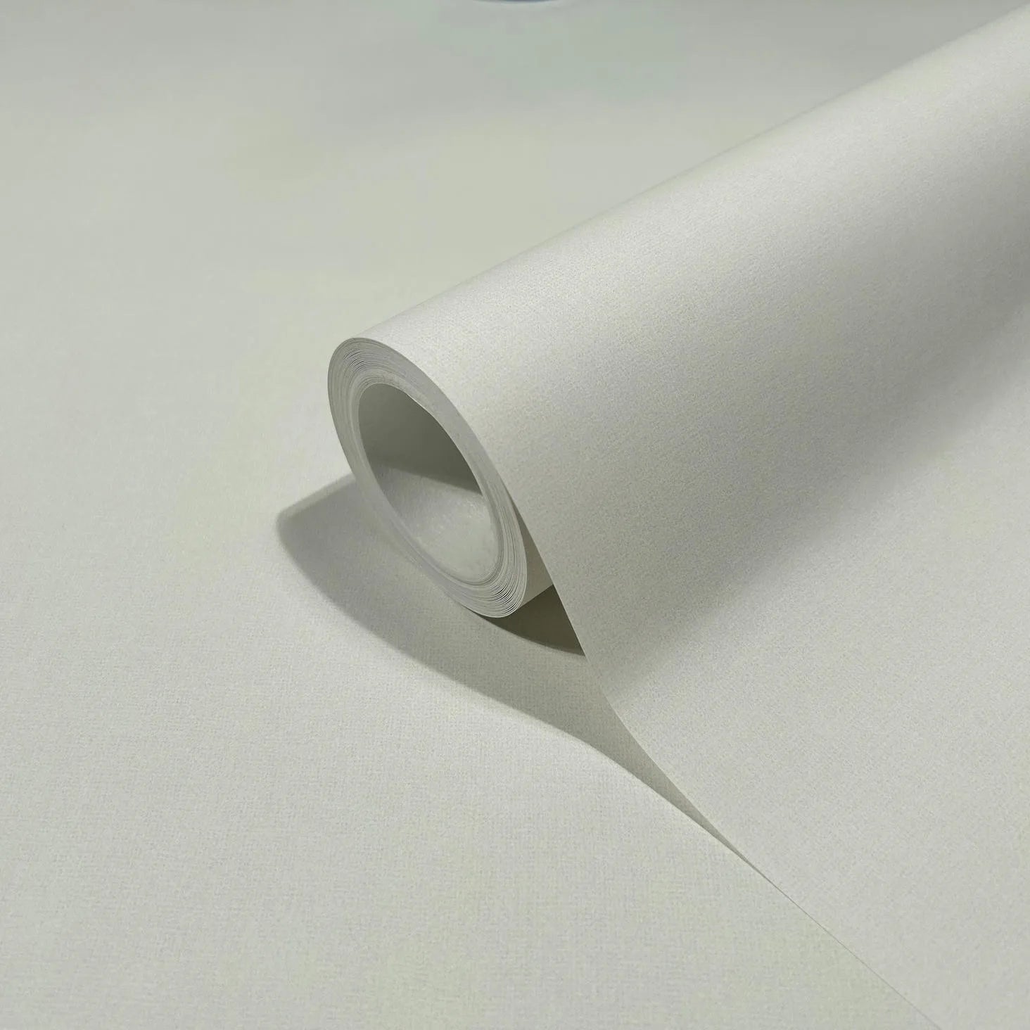 Marburg 47601 wallpaper roll close-up showing fine textured surface.