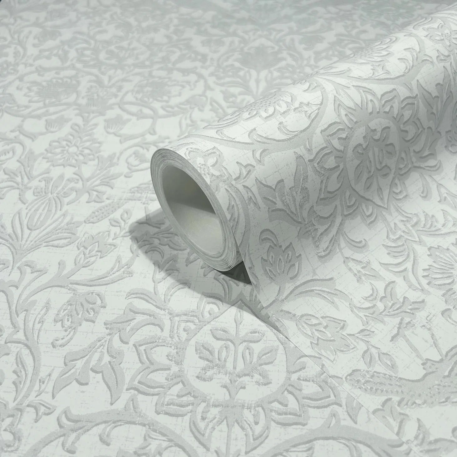 Marburg 47608 wallpaper roll with embossed floral damask pattern close-up.
