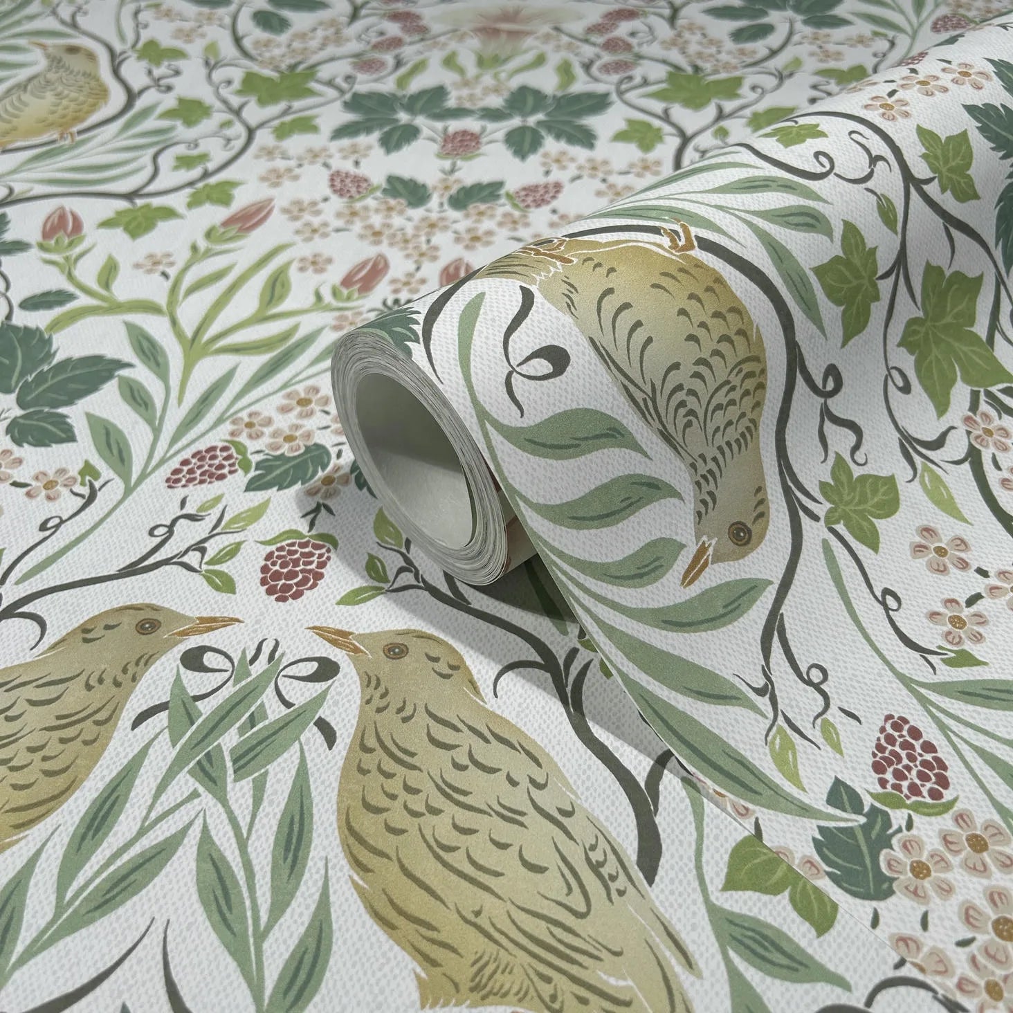 Marburg 47620 wallpaper close-up of tan birds among green leaves and red berries on a textured paper roll.