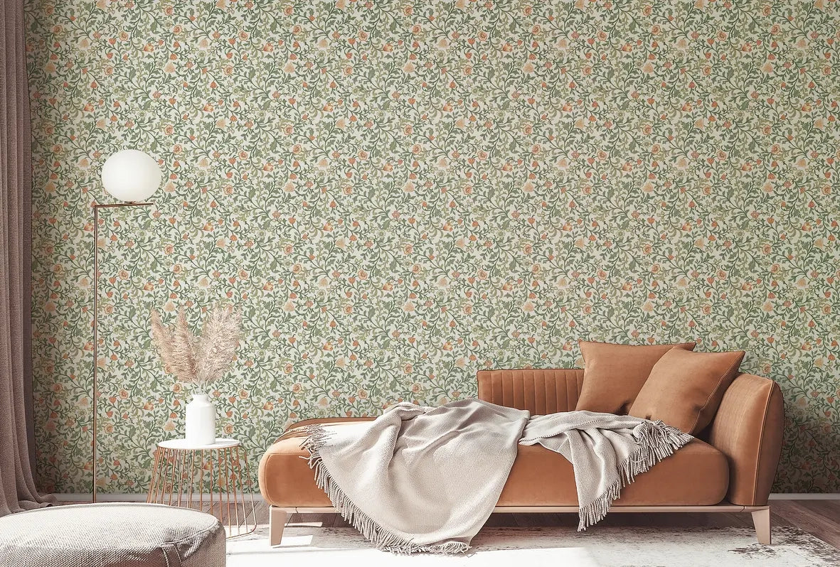 Marburg 47626 wallpaper lounge feature wall behind a low sofa with cushions and throw, round ottoman, wire side table with pampas grass, globe floor lamp and curtains, creating a cozy relaxed mood.