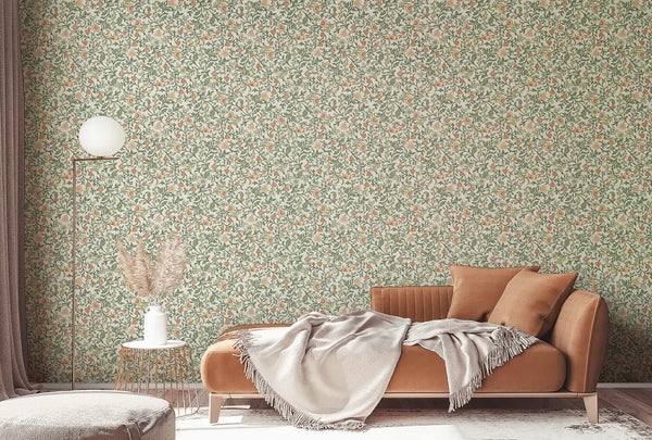 Marburg 47626 wallpaper lounge feature wall behind a low sofa with cushions and throw, round ottoman, wire side table with pampas grass, globe floor lamp and curtains, creating a cozy relaxed mood.