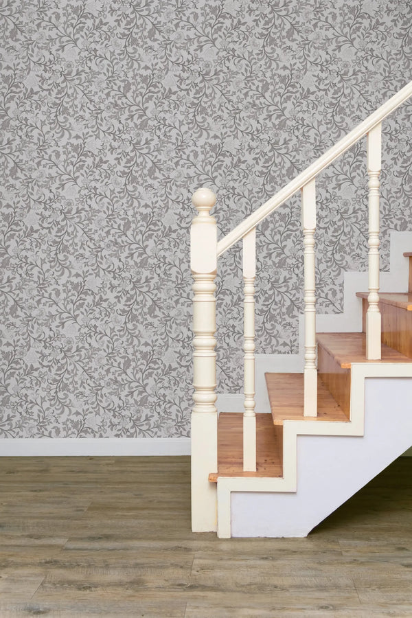Marburg 47628 wallpaper on a hallway feature wall beside a painted wood staircase and wood flooring, classic and calm.