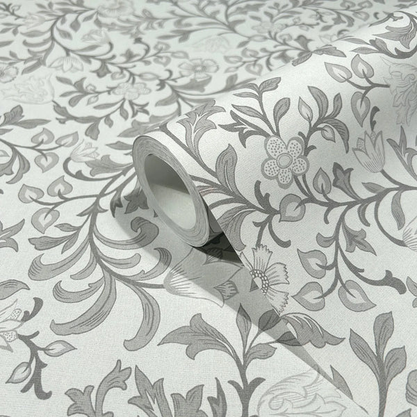 Marburg 47628 wallpaper close-up of gray floral vine pattern on light textured background, roll partially unrolled.