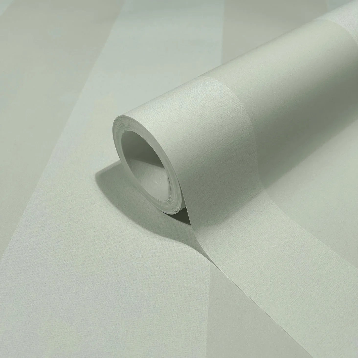 Marburg 47636 wallpaper close-up of wide tonal stripes on a roll with a subtle sheen.