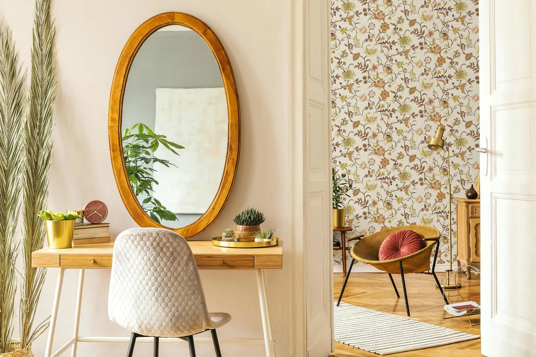Marburg Heritage 47646 trailing floral wallpaper in warm brown, orange, and pink on a dusty rose background.