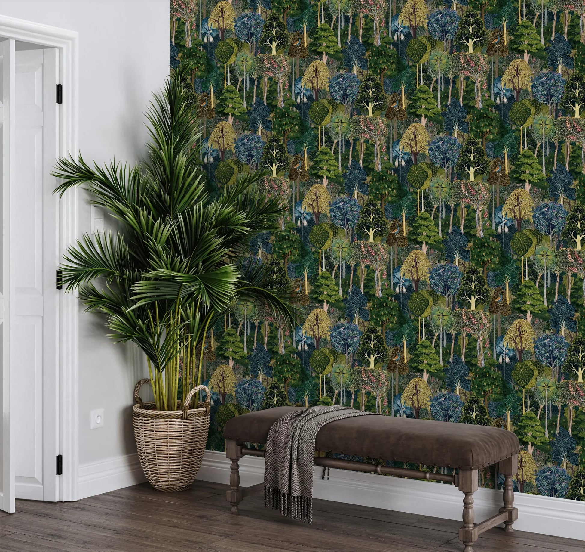 Marburg 47650 wallpaper lounge feature wall with dense forest pattern, upholstered bench with throw, wicker-basket palm, relaxed natural vibe.
