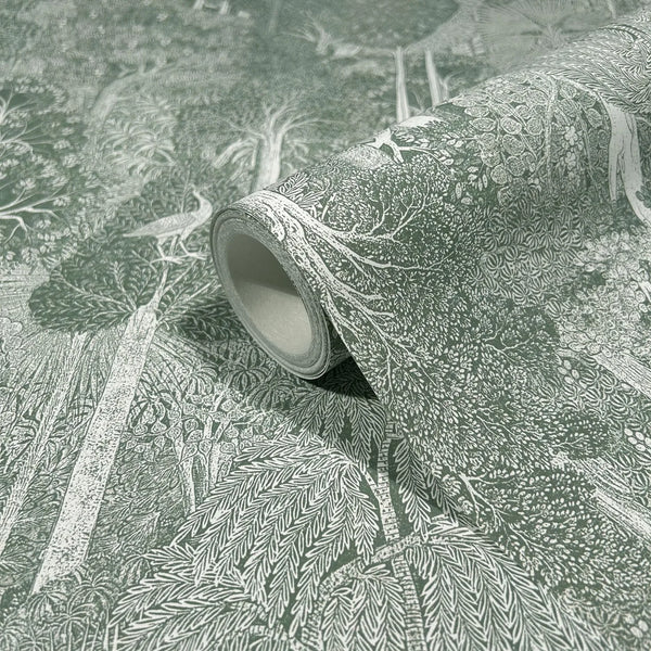 Marburg 47651 wallpaper roll close-up with intricate forest foliage and bird motif, unrolled on flat surface.