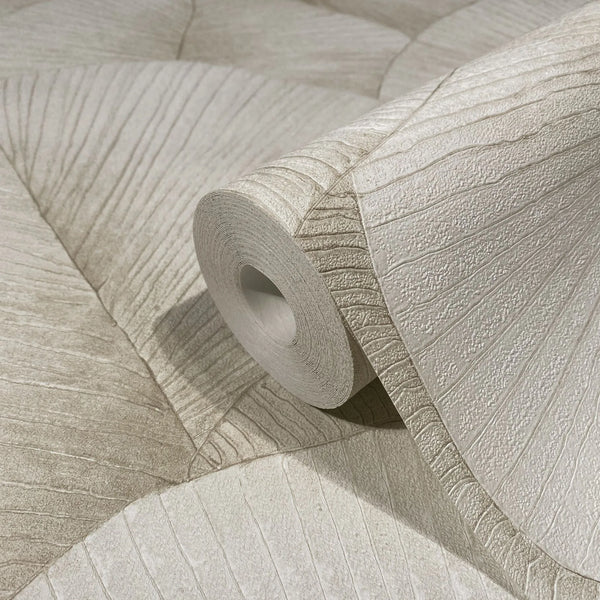 Marburg Kumano 34510 Close-up of a beige textured wallpaper roll with an embossed radiating rib pattern, shown resting on the same unrolled design.