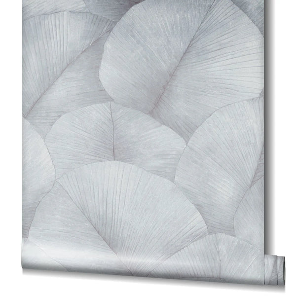 Marburg Kumano 34512 Partially unrolled wallpaper roll showing large overlapping leaf motifs in light gray on a white studio background.