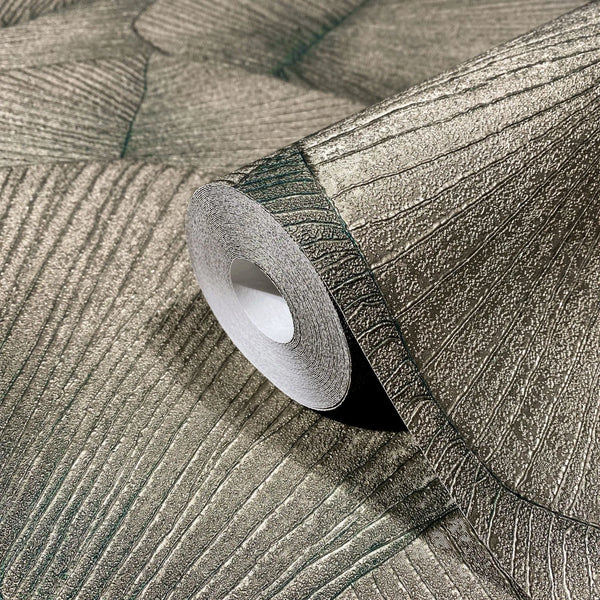 Marburg Kumano 34513 Close-up of a wallpaper roll resting on a matching sheet, showing a large leaf‑vein design with raised linear texture and a subtle sheen.
