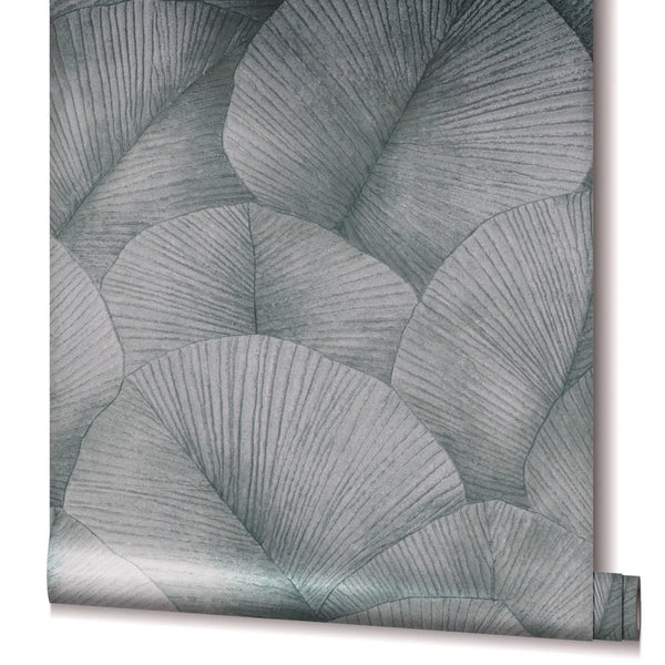 Marburg Kumano 34514 Partially unrolled wallpaper roll showing a large overlapping leaf pattern with fine veins in grey-silver tones, isolated on a white background.