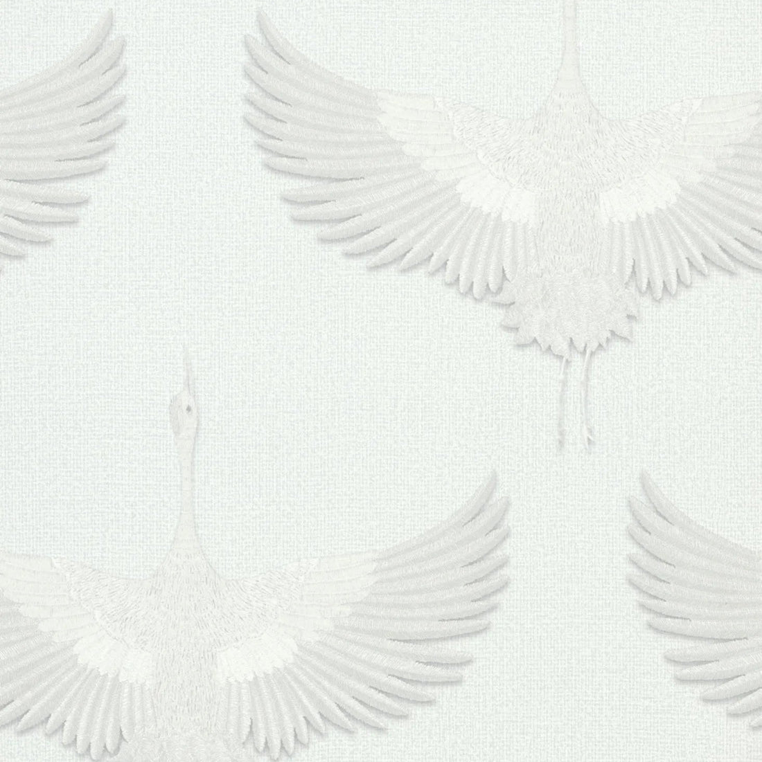 Marburg Kumano 34528 wallpaper with softly embossed cranes on a linen-like white ground.