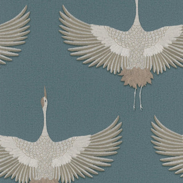 Marburg Kumano 34531 wallpaper with soaring cranes on a dusty blue linen-like background.