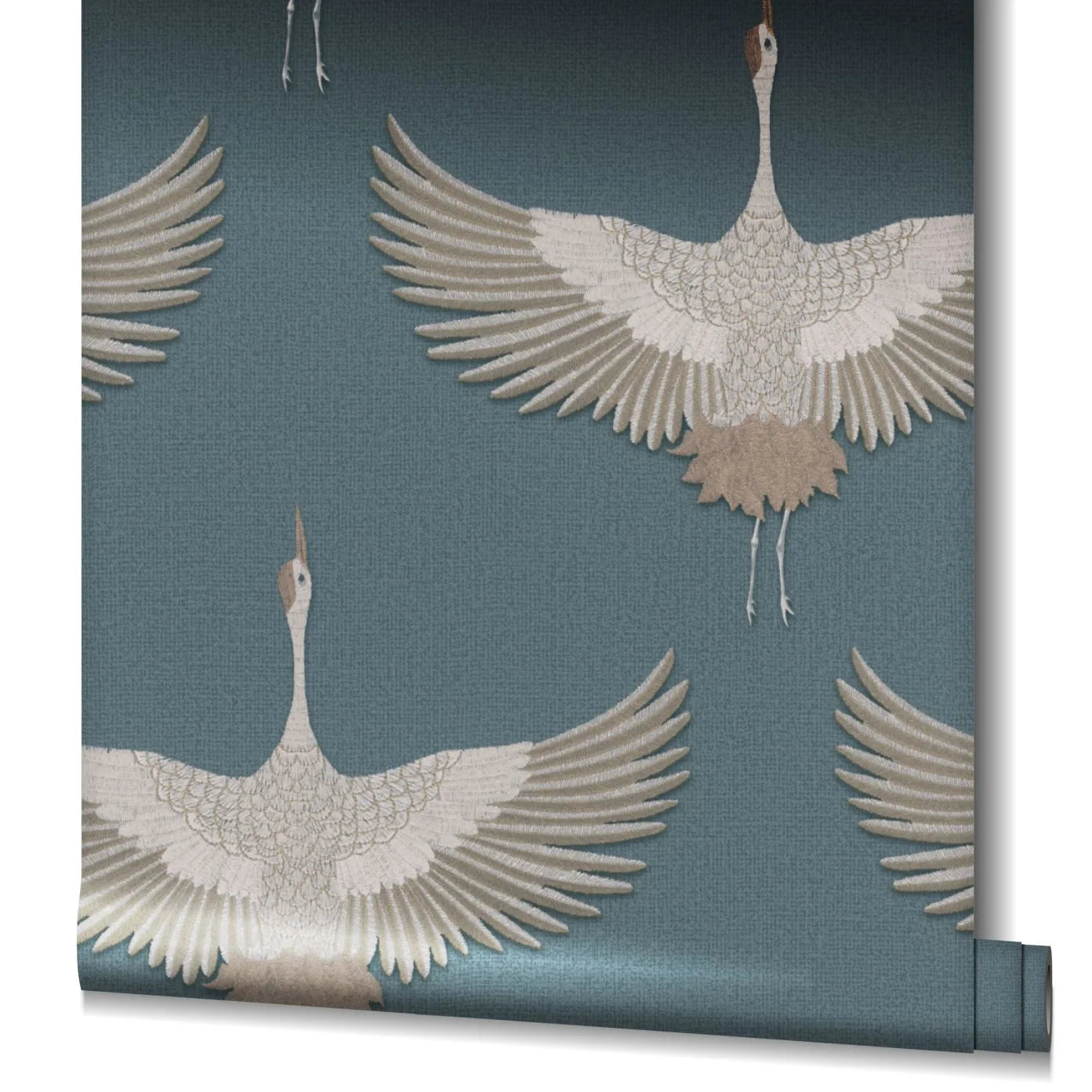 Marburg Kumano 34531 Unrolled wallpaper roll showing large beige and white cranes with outstretched wings on a blue background; roll visible at the lower right edge.