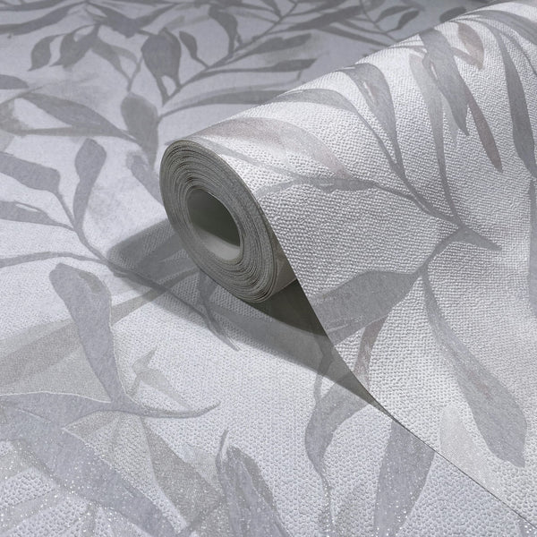 Marburg Leyla 82439 Close-up of a wallpaper roll showing a gray and white leaf pattern with a textured raised-dot surface on a matching unrolled sheet.