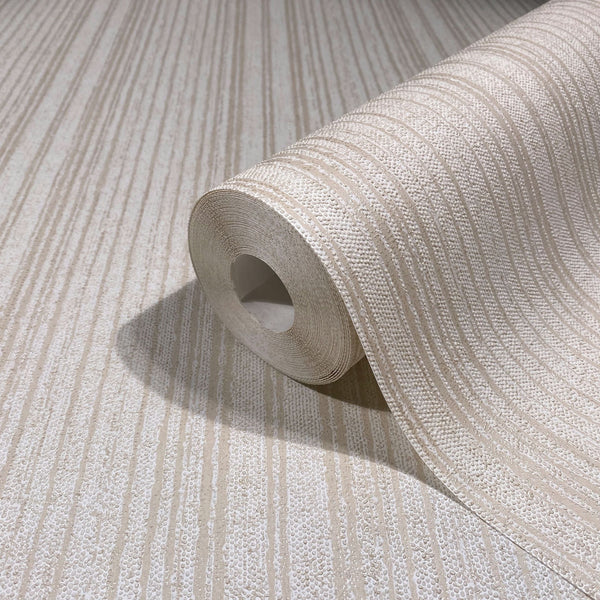 Marburg Leyla 82446 Close-up of a beige wallpaper roll with raised vertical stripe texture on matching unrolled wallpaper.
