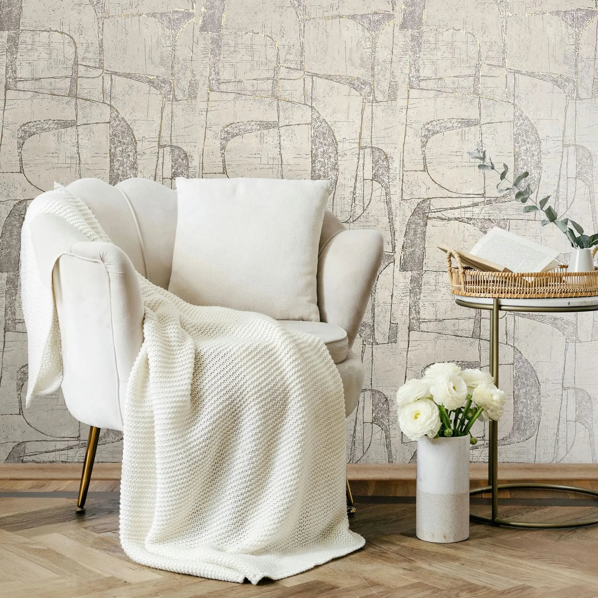 Marburg Leyla 82453 Beige wallpaper with abstract, overlapping curved geometric shapes and a distressed, textured look wallpaper on a living room feature wall.