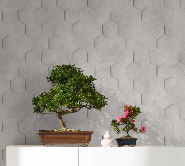 Marburg Loft Superior 34159 Light gray geometric hexagon motif with a subtle concrete-look texture and a shadowed 3D effect wallpaper shown in a styled detail.