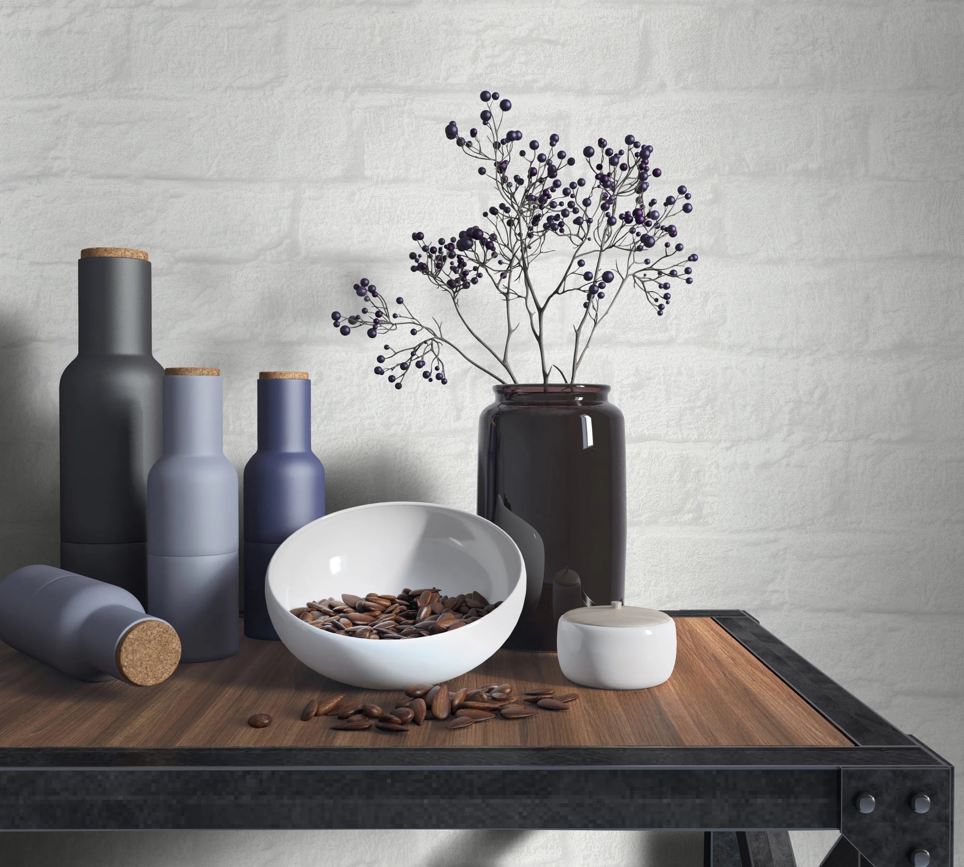 Marburg Loft Superior 34165 White brick-effect wallpaper behind a wood-and-metal table styled with matte bottles with cork stoppers, a dark glass vase holding berry stems, a white bowl with seeds, and a small lidded jar.